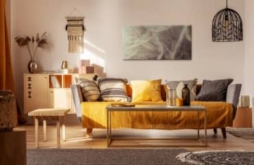Salle de séjour de style bohème - aménagements et inspirations pour une métamorphose artistique de l'intérieur